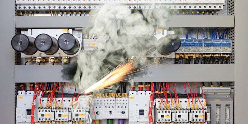 Overloaded electrical circuit causing electrical short and fire.