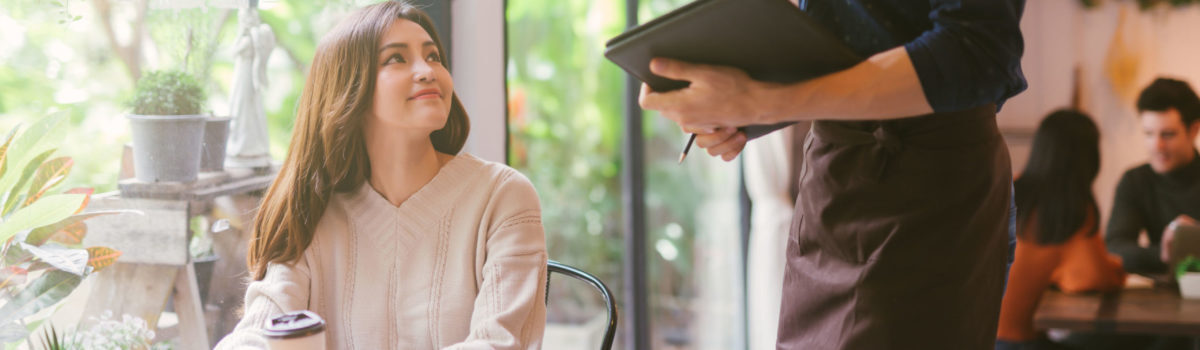 Male manager ensuring high quality customer service for customers Male manager ensuring high quality customer service for customers