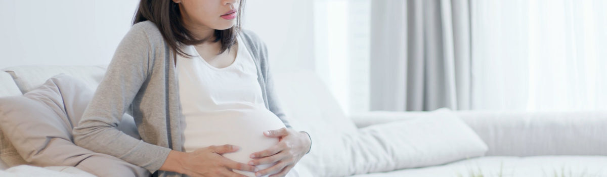 Mother Showing That She Is Suffering With Postnatal Depression Mother Showing That She Is Suffering With Postnatal Depression