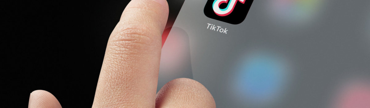 Child Accessing TikTok App Child Accessing TikTok App